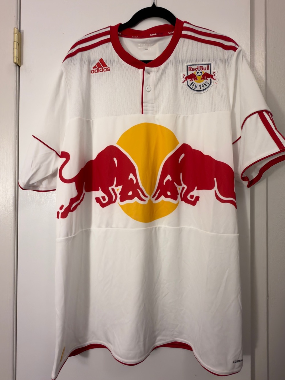 Adidas Red Bull New York soccer jersey with red bull logo on yellow circle, size